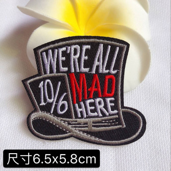 Термонашивка We all mad here TNV515